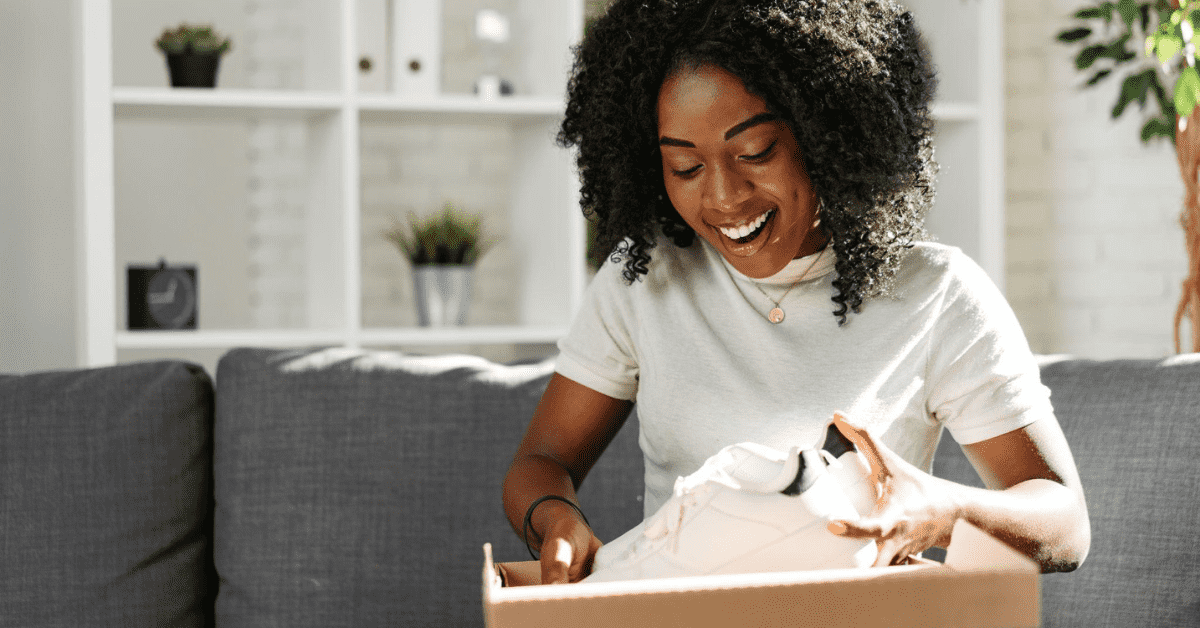 woman opening a cardboard