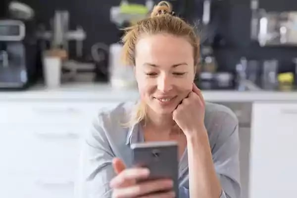 Woman looking at her phone.