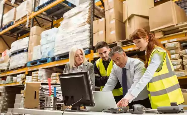 Business-meeting-in-warehouse