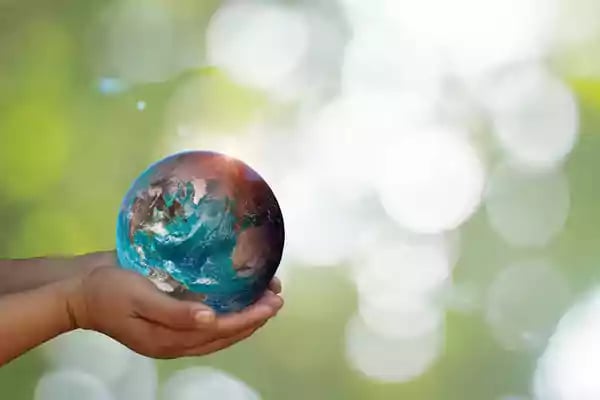Holding earth in your hands.