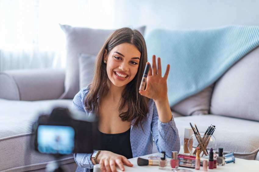 influencer filming video content about makeup