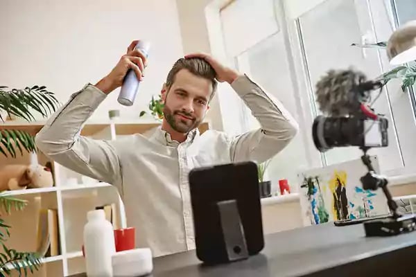 Man preparing for a video shoot.