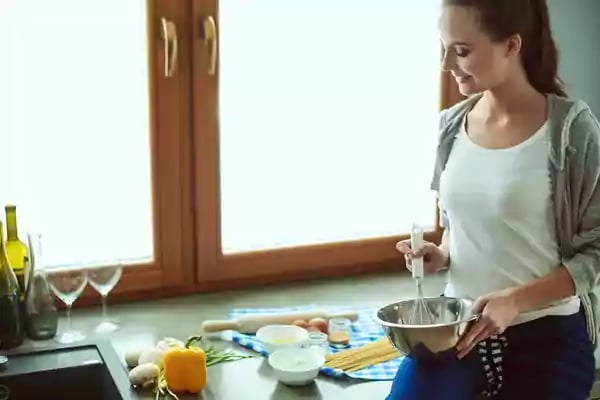 Woman cooking.