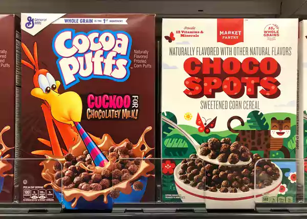 Box of Cocoa Puffs and choco spots.