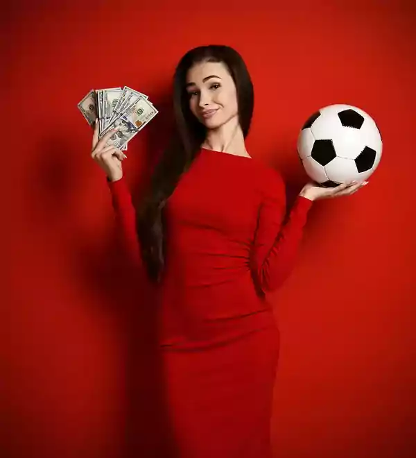 Woman holding a soccer ball and cash.