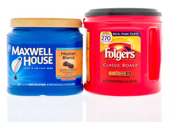 Maxwell house and Folgers coffee packages.