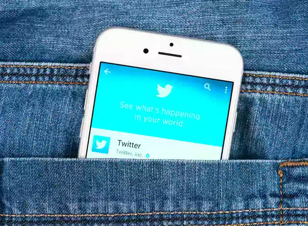 twitter on phone in pocket